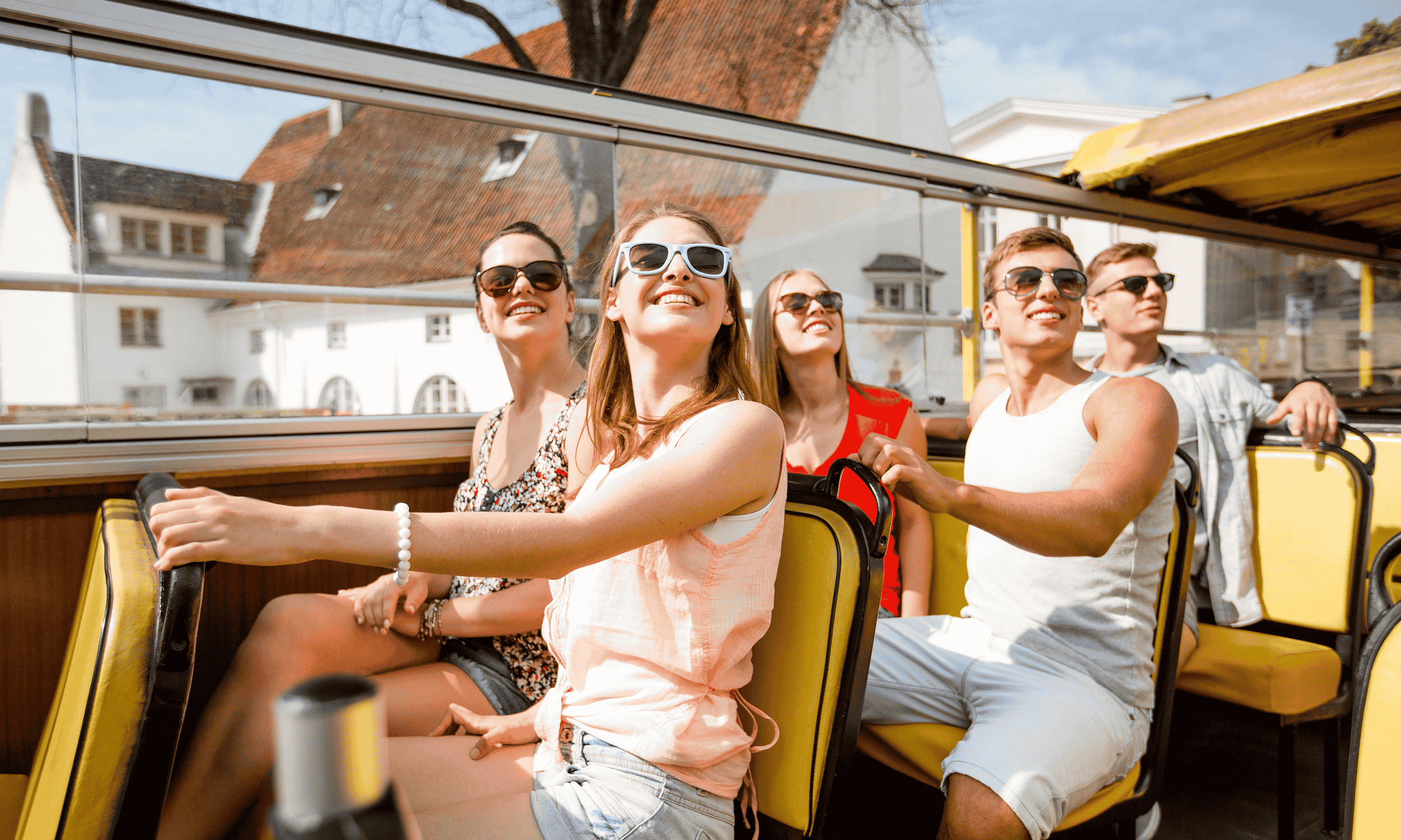 Travel club members on a bus enjoying their trip 