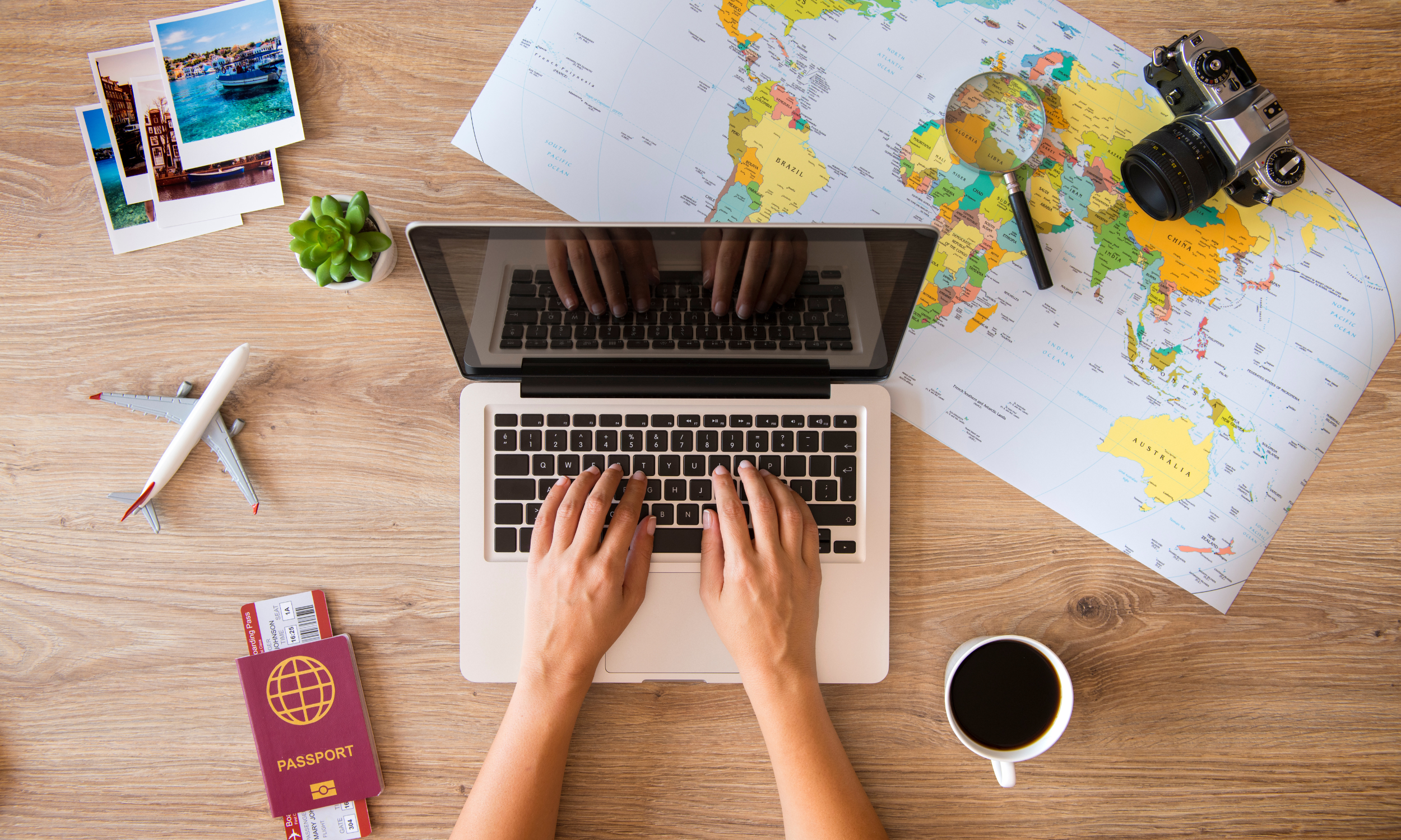 A travel executive working with a laptop